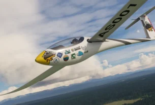 Planador AS 33 Me da Got Friends voando sobre montanhas no Microsoft Flight Simulator.