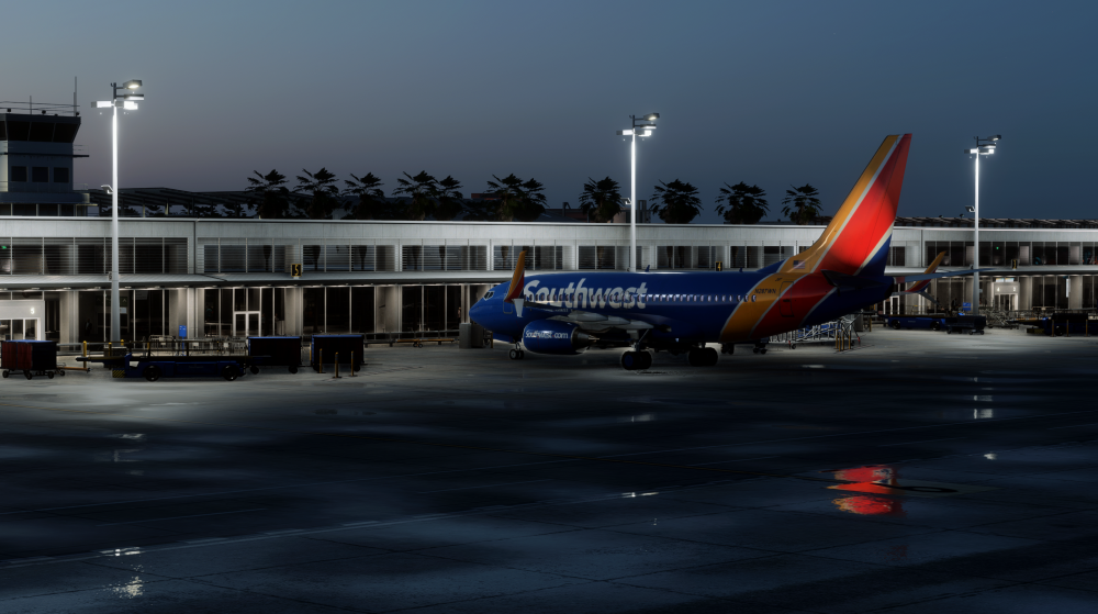 Vista aérea do cenário XWind Long Beach KLGB no MSFS 2024 ao pôr do sol