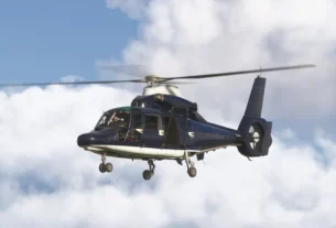 Helicóptero AS365 Dauphin da Taog’s Hangar em voo no Microsoft Flight Simulator 2024