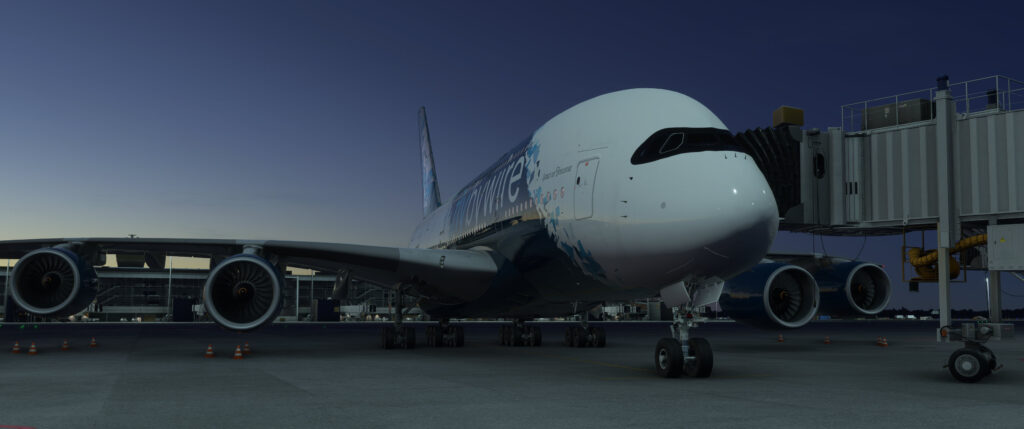 A380X da FlyByWire estacionado no gate no Microsoft Flight Simulator 2024