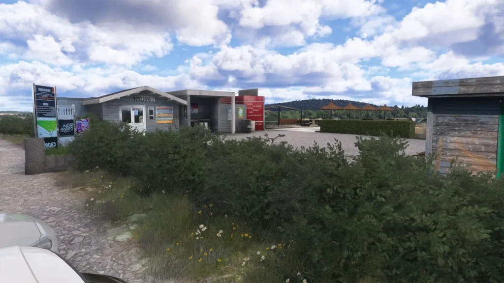 Pátio e hangares do cenário Airfield Detmold para MSFS 2024