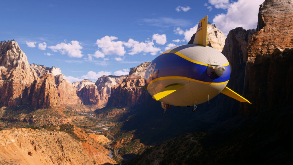 Dirigível sobre cenário de cânion no World Update 22 do Microsoft Flight Simulator 2024