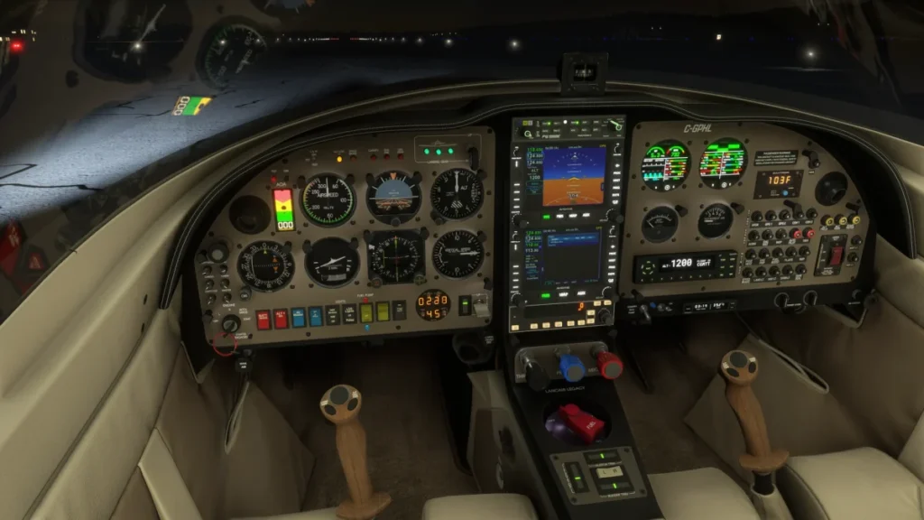 Painel analógico iluminado do Lancair Legacy em voo noturno