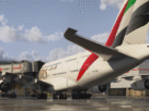 iniBuilds London Heathrow para MSFS 2024 com múltiplas jetways conectadas a uma aeronave em gate