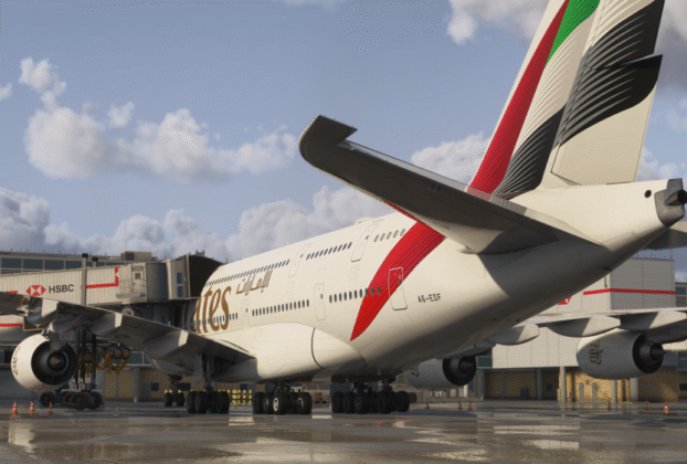 iniBuilds London Heathrow para MSFS 2024 com múltiplas jetways conectadas a uma aeronave em gate