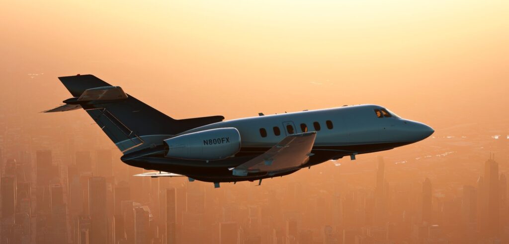 FlightFX Hawker 800XP em voo ao pôr do sol